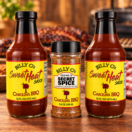 Two Billy G's Sweet Heat Sauce bottles and one Secret Spice rub in a warm BBQ scene